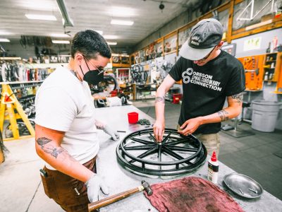 PDX Workshop A wheelchair tire being repaired.